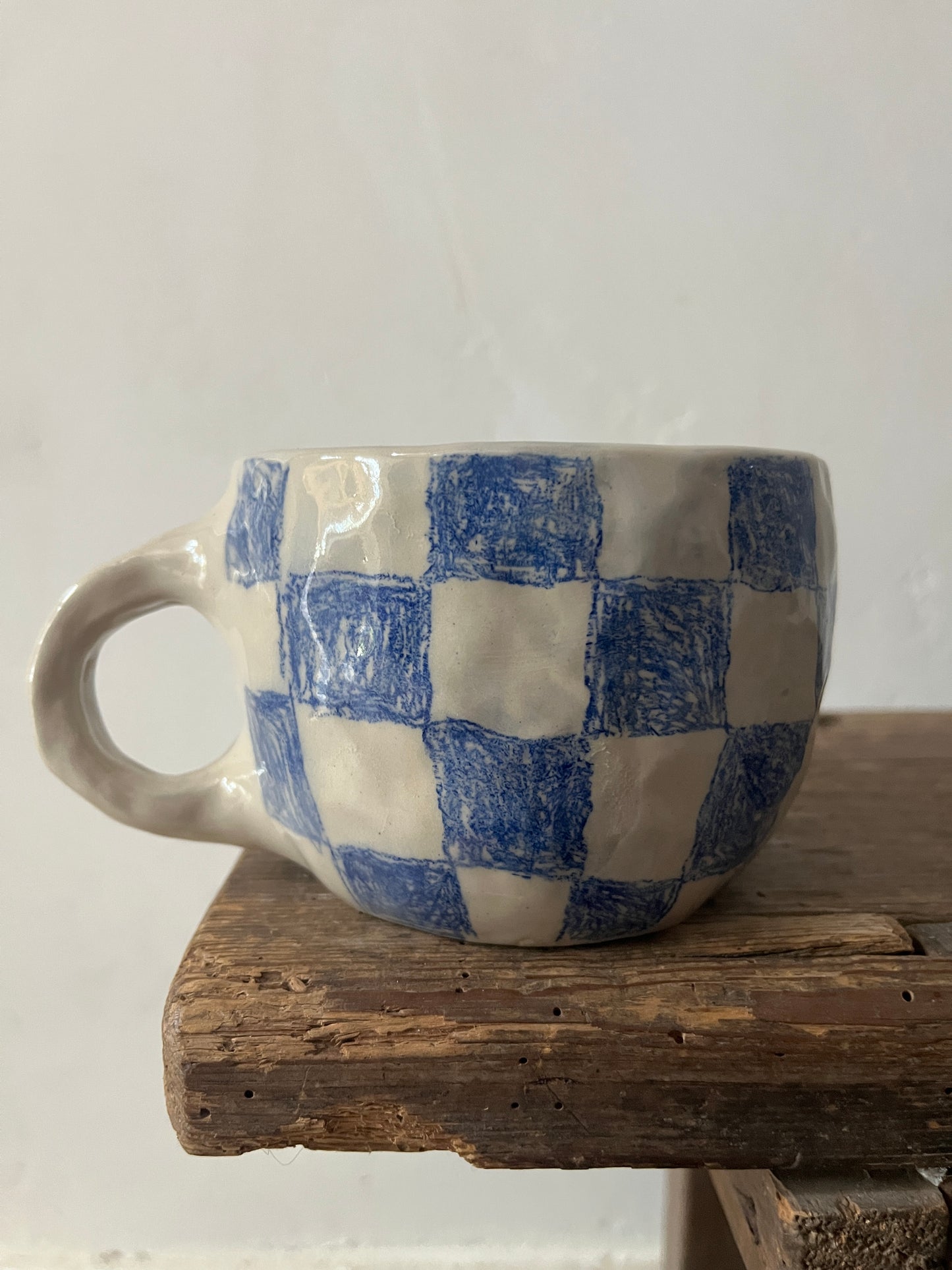 Blue checks cup