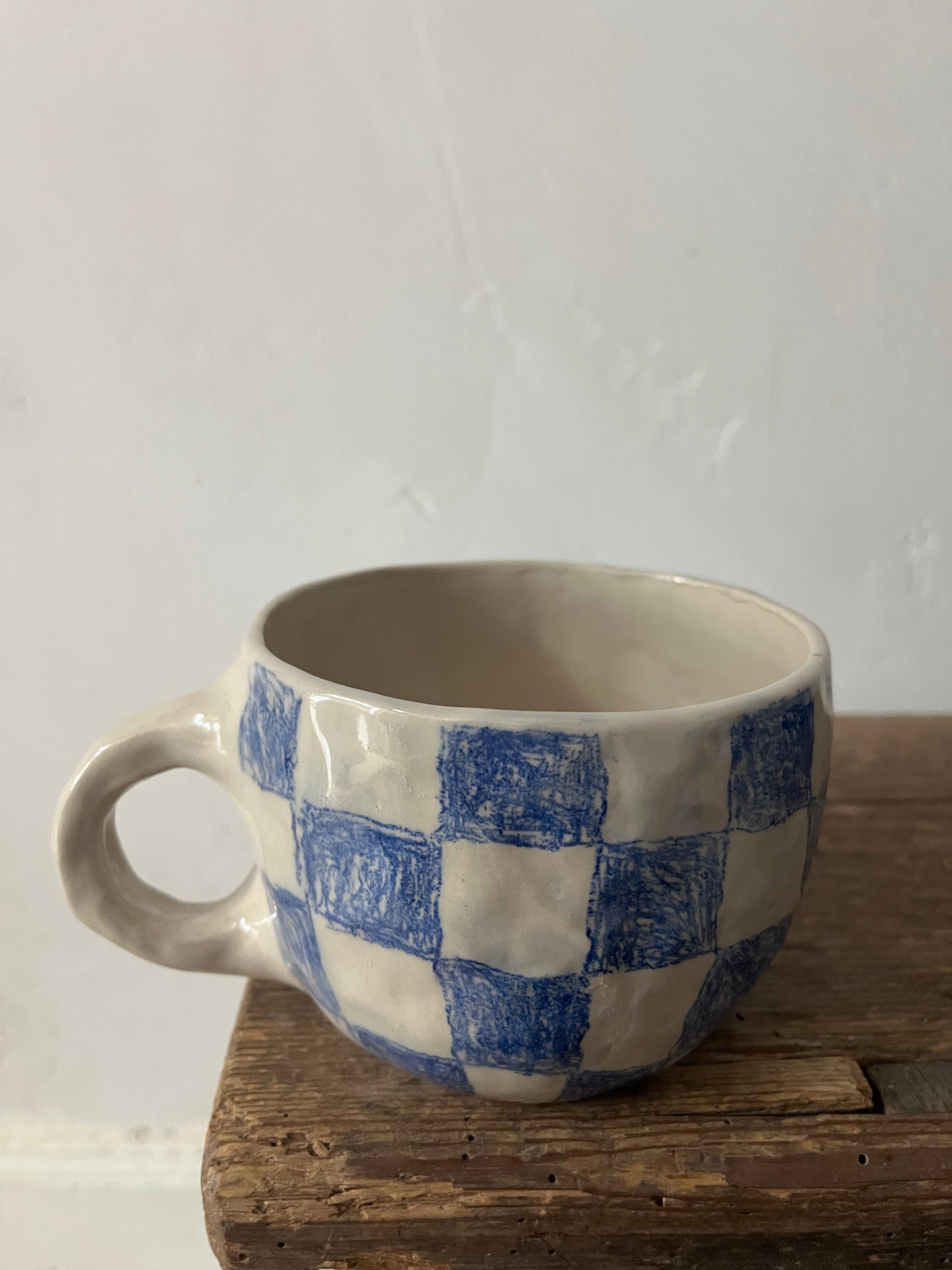 Blue checks cup
